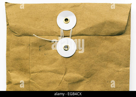 zerknittertes Papier Paket Fragment mit Schraubensicherungslack Stockfoto