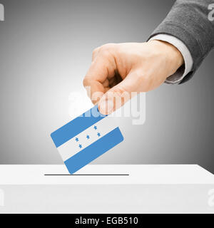 Abstimmung der Konzept - männliche einfügen Flag in Wahlurne - Honduras Stockfoto