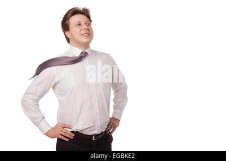 Junger Geschäftsmann lächelnd mit Krawatte weht Stockfoto