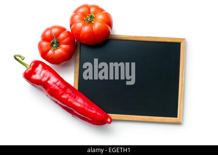 die Gemüse- und leere Tafel auf weißem Hintergrund Stockfoto