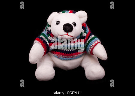 Isolierte weißer Eisbär Spielzeug mit schwarzem Hintergrund Stockfoto