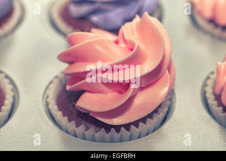 Rosa-Cupcakes-Nahaufnahme Stockfoto