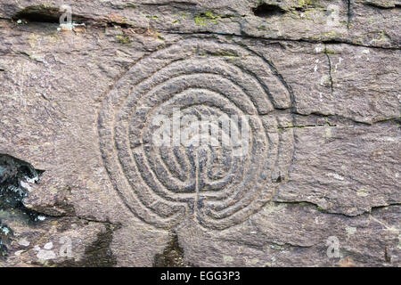 Rock, carving, kreisförmige Labyrinth-Motiv, "Rocky Valley", Cornwall, England, UK Stockfoto