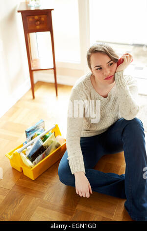 Frau, die Hausarbeit Stockfoto