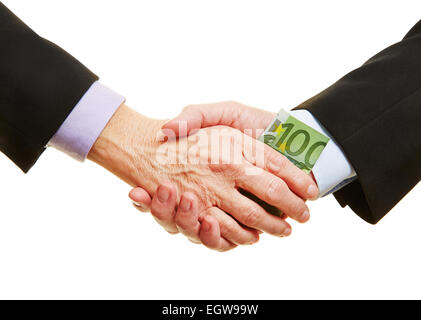 Hände geben Euro Geldschein für Business Bestechung bei handshake Stockfoto