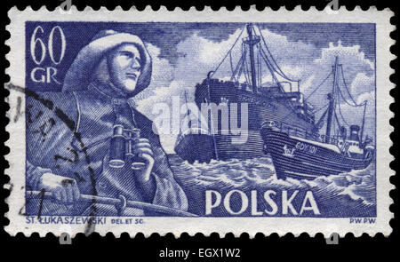 Polen - ca. 1956: Briefmarke gedruckt in Polen zeigt Fischer und polnischen Schiffe, ca. 1956 Stockfoto