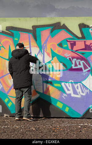 Mann ausgeführten Graffiti-Kunstwerk in Digbeth, Birmingham, UK Stockfoto