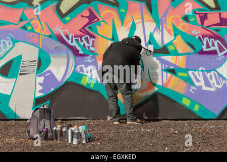 Mann ausgeführten Graffiti-Kunstwerk in Digbeth, Birmingham, UK Stockfoto