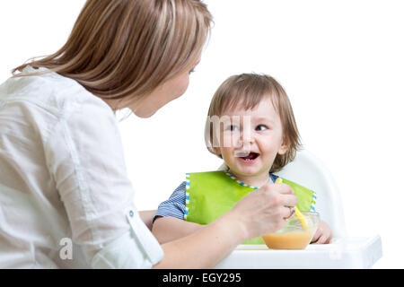 Mutter, Fütterung Kleinkind Jungen Stockfoto