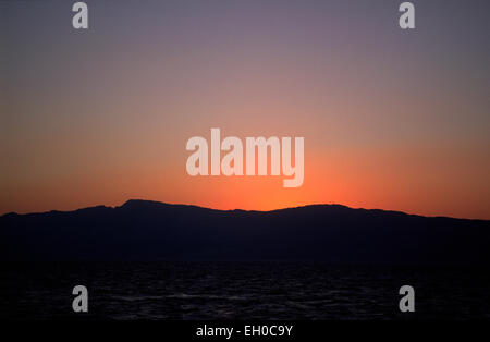 Griechenland, nordöstliche Ägäische Inseln, Insel Ikarìa bei Sonnenuntergang Stockfoto