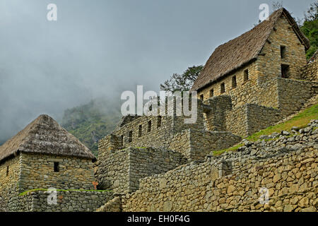 Häuser in Landwirtschaft, Machu Picchu Inka-Ruinen in der Nähe von Aguas Calientes, Cusco, Peru Stockfoto