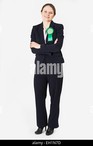 Full Length Portrait Of Politikerin tragen grüne Rosette Stockfoto