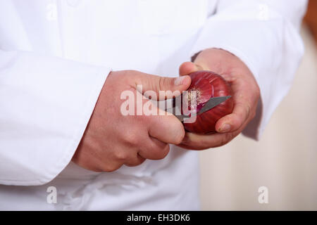 Ein Hand-schneiden ein Stockfoto