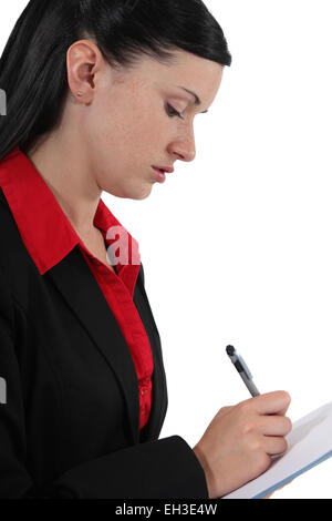 Geschäftsfrau Notizen Stockfoto