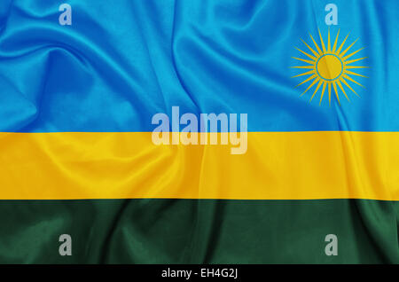 Ruanda - winken Nationalflagge auf Seide Textur Stockfoto