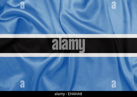 Botswana - winken Nationalflagge auf Seide Textur Stockfoto