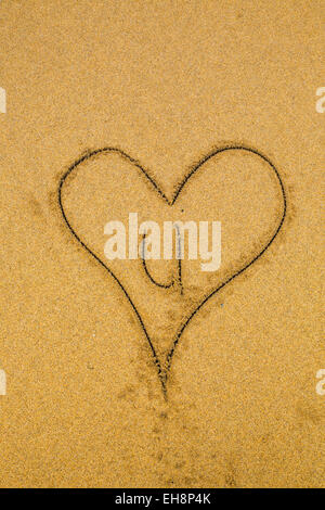 Herz im Sand Stockfoto