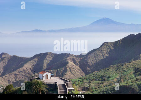 Ermita de San Juan-Kapelle, am hinteren Berg Teide Vulkan auf Teneriffa, Hermigua, La Gomera, Kanarische Inseln, Spanien Stockfoto