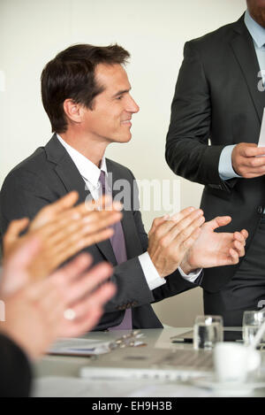 Geschäftsmann applaudieren Tagung Stockfoto