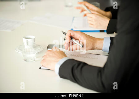 Geschäftspartnern zusammenarbeiten Stockfoto