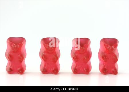 vier rote Gummibärchen Stockfoto