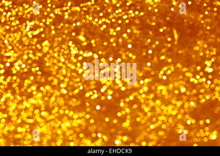 Gold-Spots Bokeh Hintergrund Stockfoto