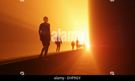 Menschen gehen, um das Licht Stockfoto