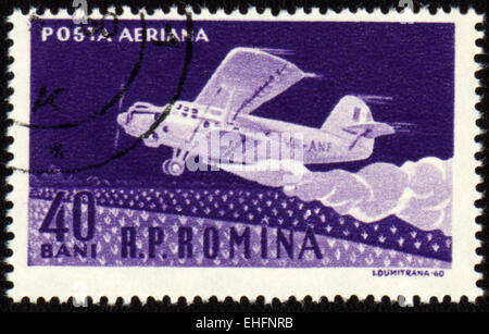 Rumänien - ca. 1960: Eine Briefmarke gedruckt in Rumänien zeigt Steigung von altes Flugzeug AN-2 Stockfoto