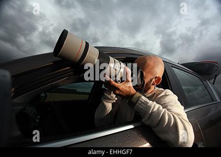 Reisenden in einen Jeep Himmel Wolken Herbst Stockfoto