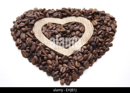 Kaffeebohnen im Herzen Stockfoto