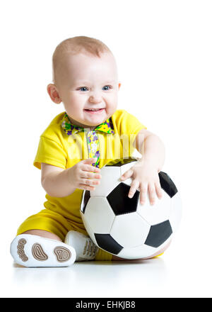 Kind Junge mit Fußball Stockfoto