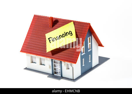Symbolisches Bild, Haus mit ein Post-It Note, Finanzierung Stockfoto