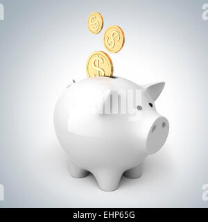 Sparschwein mit 3 Münzen Stockfoto