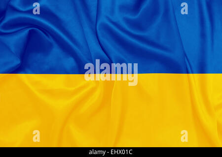 Ukraine - winken Nationalflagge auf Seide Textur Stockfoto