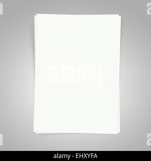 Leere weiße Papiere auf einem grauen Hintergrund mit Schatten Stockfoto