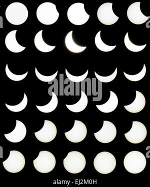 Regensburg, Deutschland. 20. März 2015. Ein zusammengesetztes Bild zeigt die verschiedenen Bühne, in der der Mond die Sonnenscheibe bei einer partiellen Sonnenfinsternis in Regensburg, Deutschland, 20. März 2015 bewegt sich über. Eine partielle Sonnenfinsternis fand am 20. März 2015, mit dem Mond deckt bis zu 71 Prozent der Sonne. Foto: Armin Weigel/Dpa/Alamy Live-Nachrichten Stockfoto