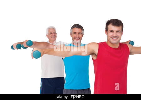 Fit Männer heben Hanteln zusammen Stockfoto