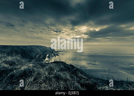 Sonnenaufgang am Filey Brigg, Yorkshire, Großbritannien. Stockfoto