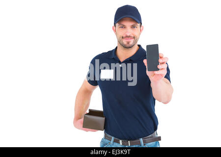 Gut aussehend Lieferung Mann mit Handy Stockfoto
