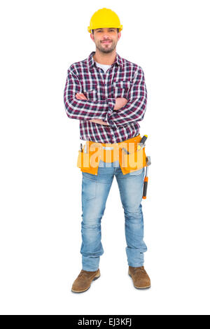 Arbeiter stehend Arme verschränkt Stockfoto