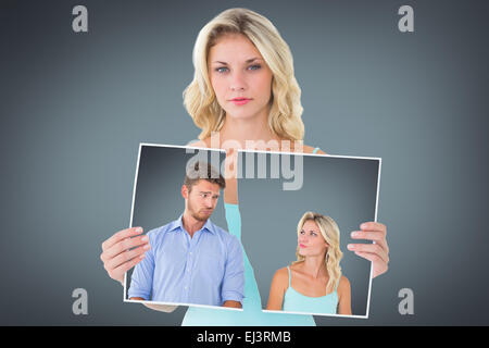 Zusammengesetztes Bild des jungen Paares Grimassen Stockfoto