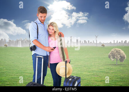 Zusammengesetztes Bild attraktives junges Paar bereit, in Urlaub fahren Stockfoto