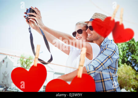 Zusammengesetztes Bild stilvollen jungen Paares nehmen ein Selbstporträt Stockfoto