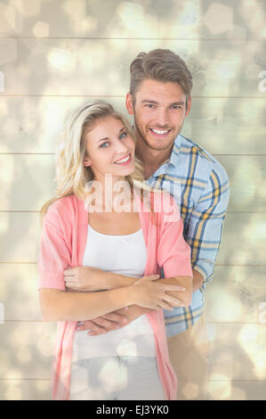 Zusammengesetztes Bild attraktives junges Paar lächelnd zusammen Stockfoto