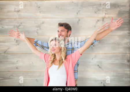 Zusammengesetztes Bild mit attraktives junges Paar stehen die Hände Stockfoto