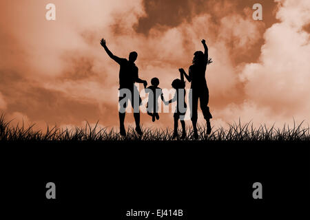 Zusammengesetztes Bild der Silhouette der Familie springen Stockfoto