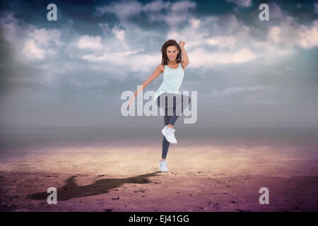 Zusammengesetztes Bild Fit Frau tun aerobe Übung Stockfoto