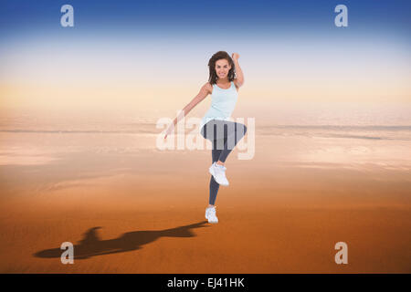 Zusammengesetztes Bild Fit Frau tun aerobe Übung Stockfoto