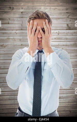 Zusammengesetztes Bild der Geschäftsmann mit Kopfschmerzen Stockfoto