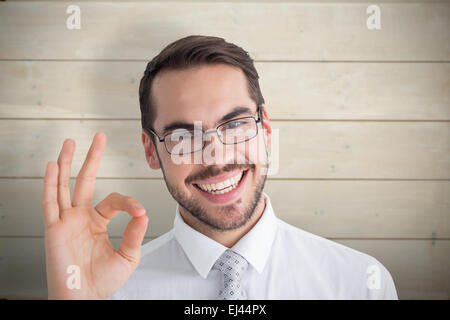 Zusammengesetztes Bild der glücklichen Geschäftsmann Ordnung Geste Stockfoto